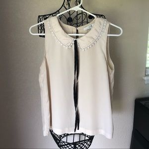 Cream Colored Blouse With Black Tie